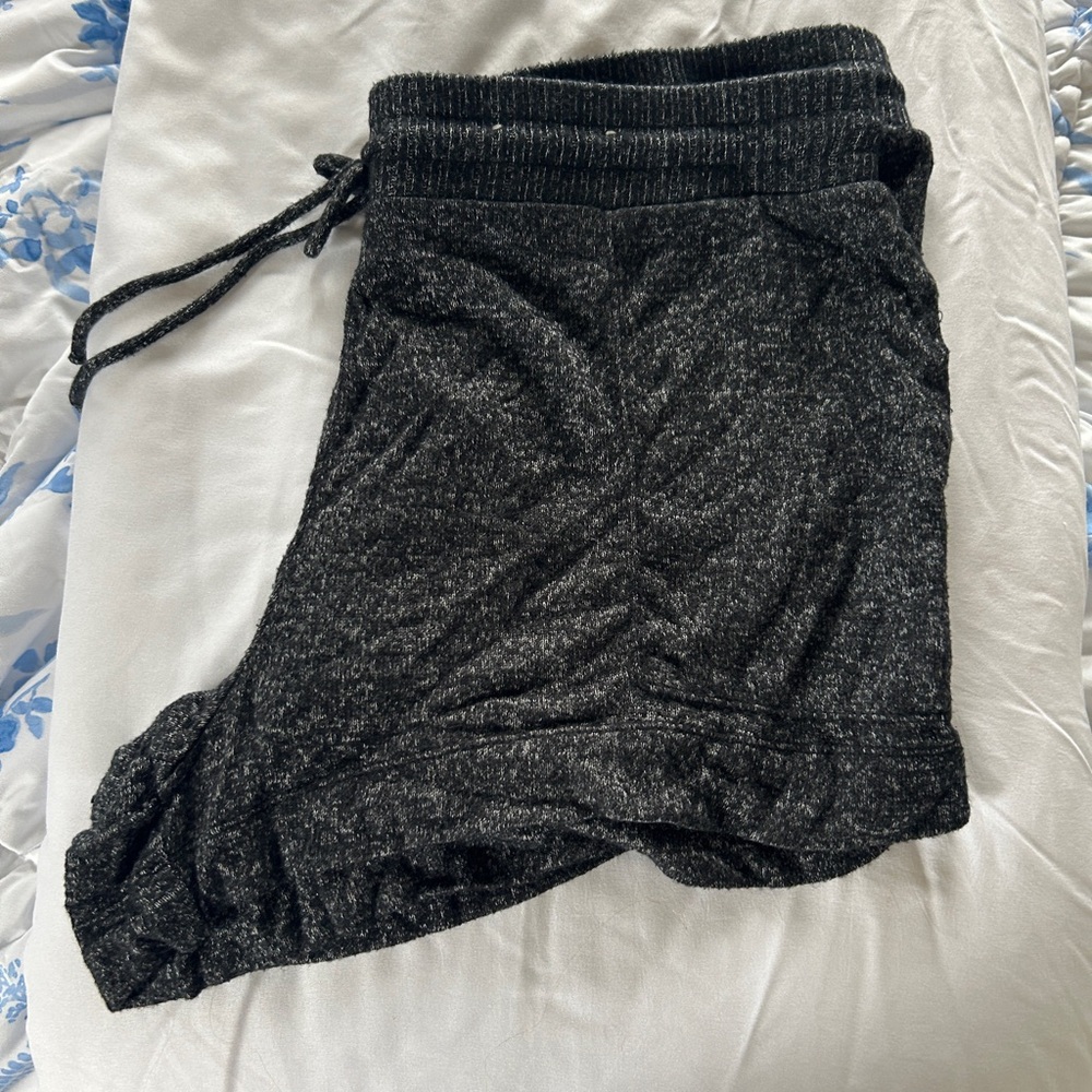 Stars above black pajama shorts
